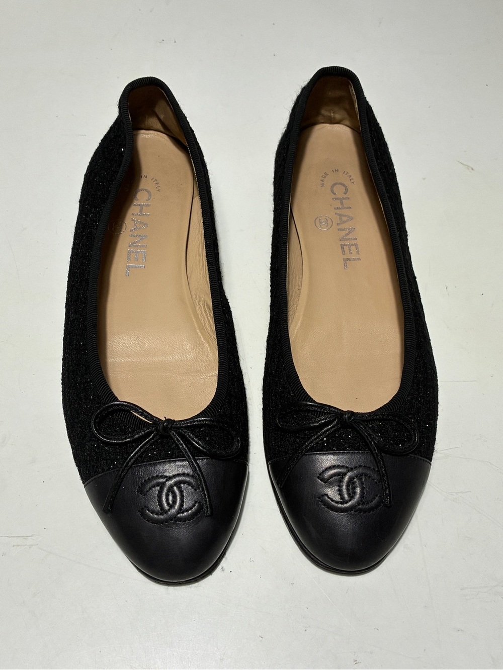 CHANEL Black Quilted Cap-Toe CC Logo Ballet Flats